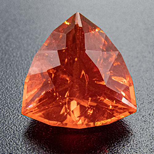 Fire Opal from Mexico. 2.45 Carat. Cracks in pavilion formed more than 10 years ago, have not grown ever since and are hardly visible from above. Excellent colour anw very good cut.