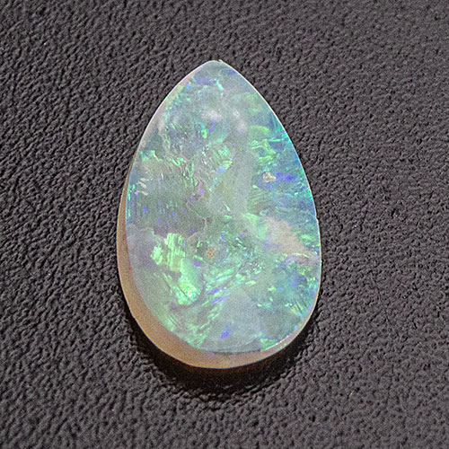 Opal from Australia. 0.32 Carat. Thin platelet, must be set with care
