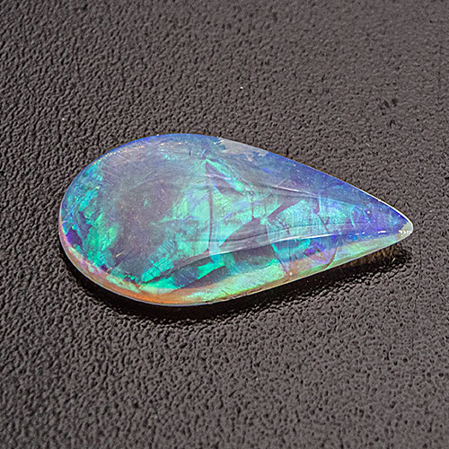 Opal from Australia. 0.55 Carat. Cabochon Pear, translucent
