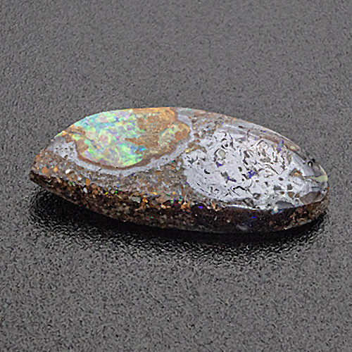 Boulder opal from Australia. 2.68 Carat. Cabochon Fancy