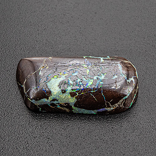 Boulder opal from Australia. 7.18 Carat. Cabochon Fancy, opaque