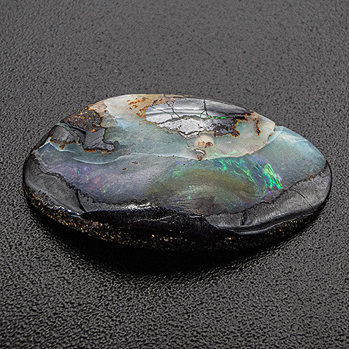 Boulder opal from Australia. 5.25 Carat. Cabochon Fancy, opaque