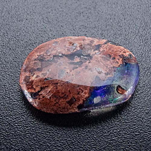 Boulder opal from Australia. 2.01 Carat. Cabochon Oval, opaque