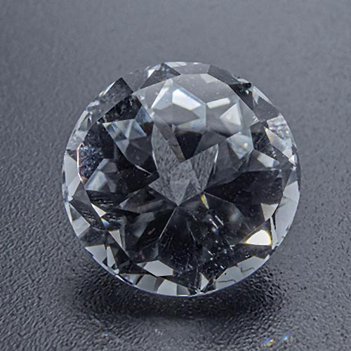 Topaz from Namibia. 4.98 Carat. So-called silver topaz from the Little Spitzkoppe mountain. Unusual cut with four small facets instead of one large table facet