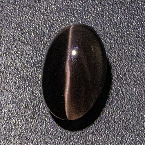 Fibrolite (Sillimanite Cat´s eye from Brazil. 2.38 Carat. Cabochon Oval, translucent