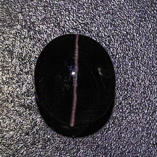 Fibrolite (Sillimanite Cat´s eye from Brazil. 2.83 Carat. Cabochon Oval, translucent