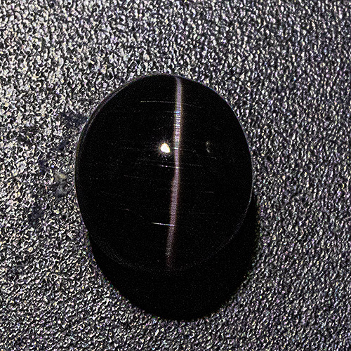 Fibrolite (Sillimanite Cat´s eye from Brazil. 3.03 Carat. Pavilion slightly too deep, very sharp cat´s eye