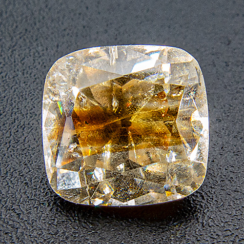 Cassiterite from China. 3.24 Carat. Cushion, very distinct inclusions