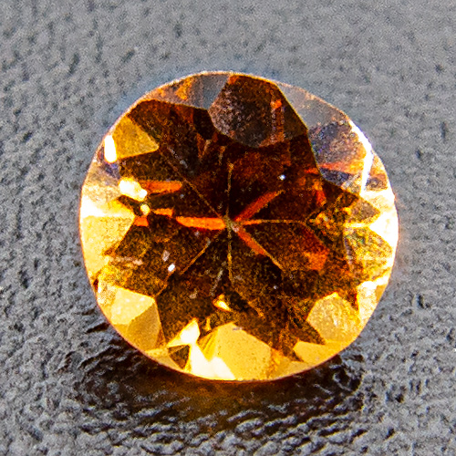 Hessonite Garnet from Sri Lanka. 1 Piece. Round, small inclusions
