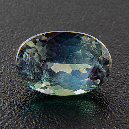 Alexandrite from India. 0.61 Carat. Small natural cavity at girdle can be hidden in bezel setting