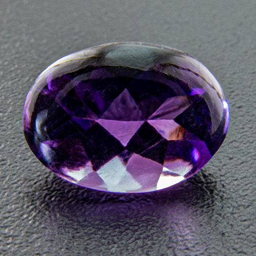 Amethyst from Zambia. 1 Piece. Bufftop Oval, small inclusions