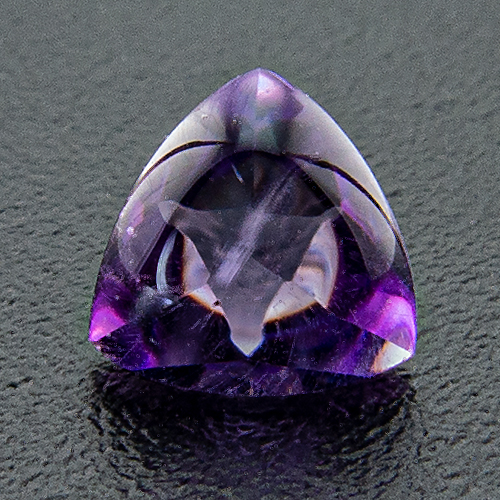 Amethyst from Brazil. 1 Piece. Bufftop Trillion, small inclusions