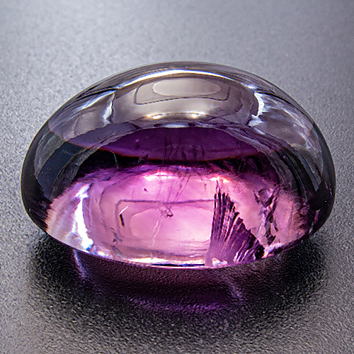 Amethyst from Zambia. 30.18 Carat. Cabochon Oval, distinct inclusions