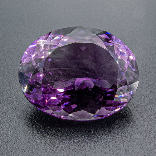 Amethyst from Zambia. 24.1 Carat. Shows colour zoning, typical for quartz