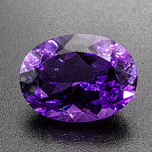 Amethyst from Brazil. 7.18 Carat. Oval, small inclusions