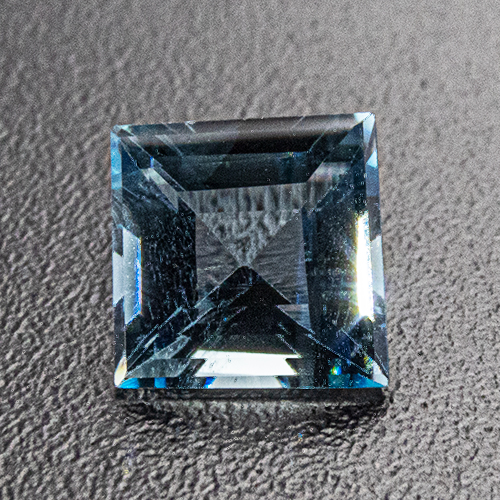 Aquamarine from Brazil. 0.31 Carat. Very good colour but slightly asymmetrical, should be hidden in a bezel setting