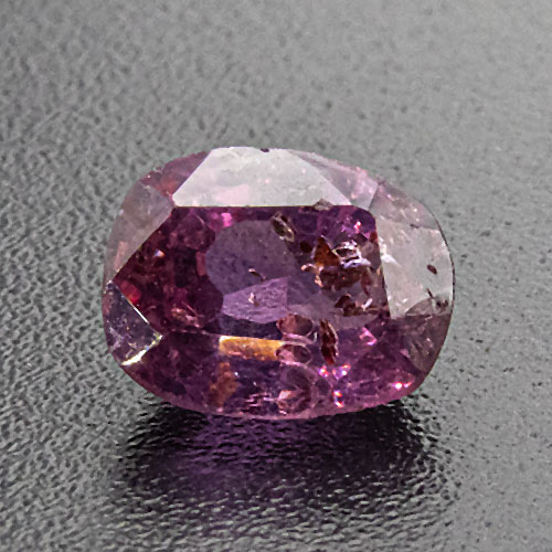Purple Sapphire from Sri Lanka. 0.81 Carat. Untreated purple sapphire from an old collection, interesting mineral inclusions, most likely apatite