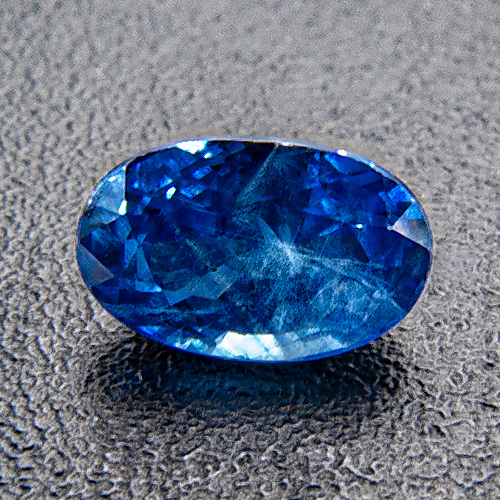 Sapphire. 1 Piece. Oval, very distinct inclusions
