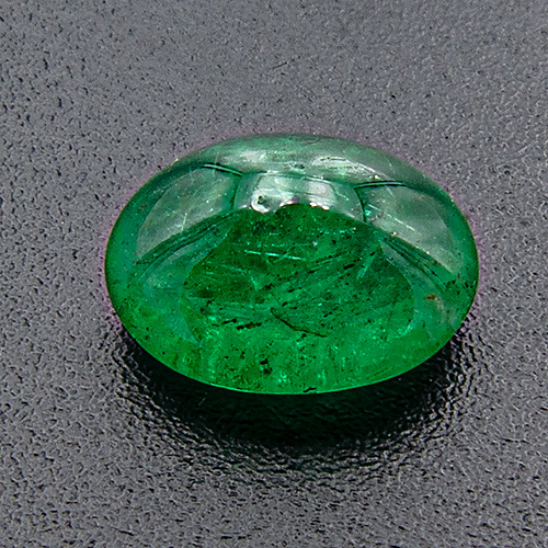 Emerald from Brazil. 1.52 Carat. Cabochon Oval, very, very distinct inclusions