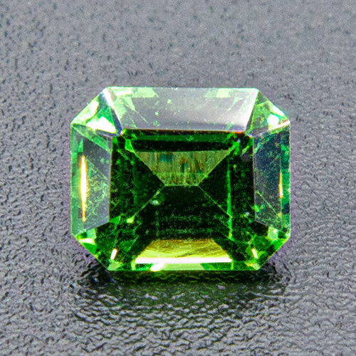 Tsavorite Garnet from Tanzania. 0.45 Carat. Emerald Cut, very small inclusions