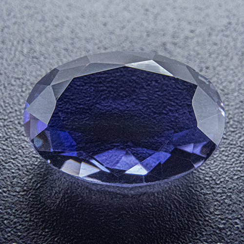 Iolite from India. 2.45 Carat. Very good colour and clarity but rather poor cut (shallow pavilion). This was an appraiser´s masterstone for second best iolite colour. For that purpose quality of cut was not important, only colour was...