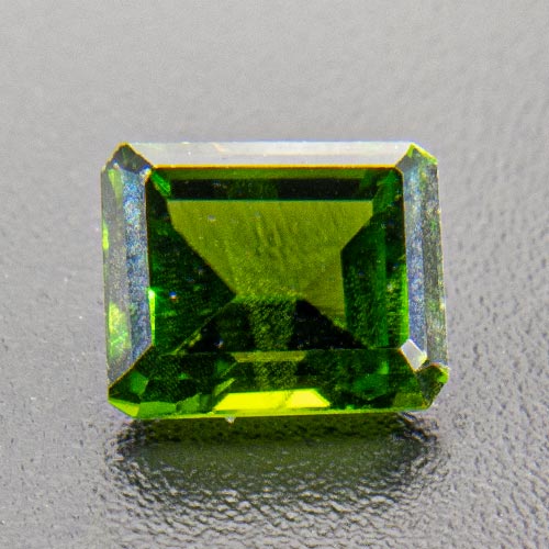 Chrome Diopside from Russia. 0.76 Carat. Emerald Cut, distinct inclusions