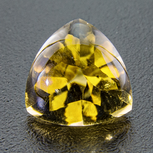 Citrine from Brazil. 1 Piece. Bufftop Trillion, very very small inclusions