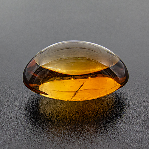 Citrine from Brazil. 14.76 Carat. Cabochon Oval, very small inclusions