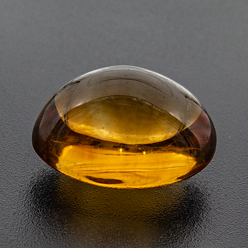 Citrine from Brazil. 15.23 Carat. Cabochon Oval, eyeclean