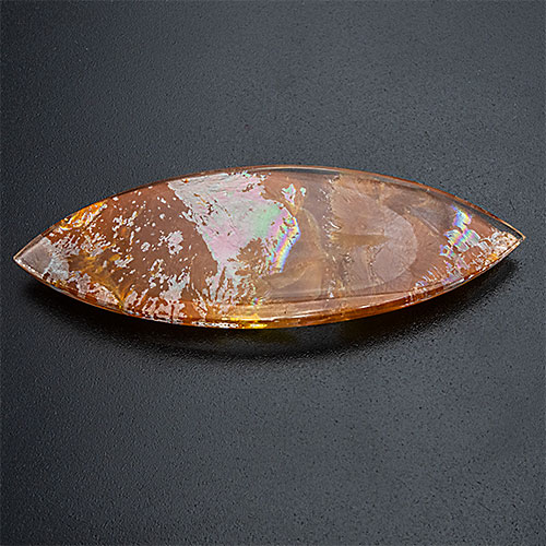 Included quartz from Brazil. 76.3 Carat. Cabochon Navette, translucent