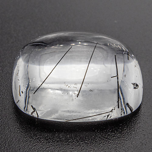 Included quartz from Brazil. 20.83 Carat. Unidentified inclusions, possibly tourmaline