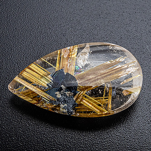 Rutilated Quartz from Brazil. 8.46 Carat. Cabochon Pear, very, very distinct inclusions