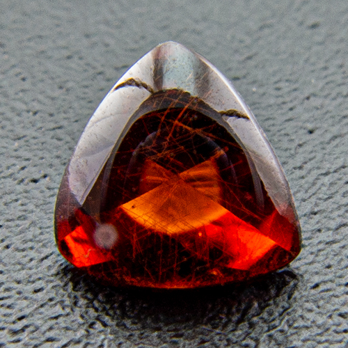 Pyrope Garnet from India. 1 Piece. Bufftop Trillion, small inclusions