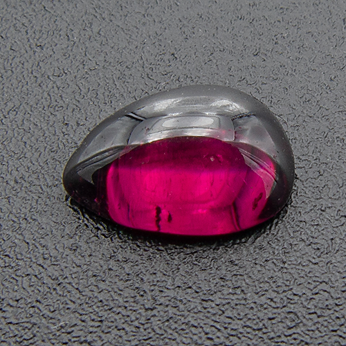 Rhodolite Garnet from India. 1 Piece. Cabochon Pear, small inclusions