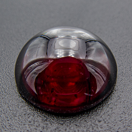 Rhodolite Garnet from India. 8.65 Carat. Cabochon Round, small inclusions