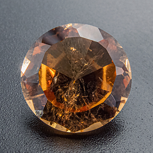Hessonite Garnet from Canada. 6.51 Carat. Exceptionally large, beautiful hessonite garnet from the Jeffrey Mine in Asbestos, Canada. Shows "treacle" typical for hessonite