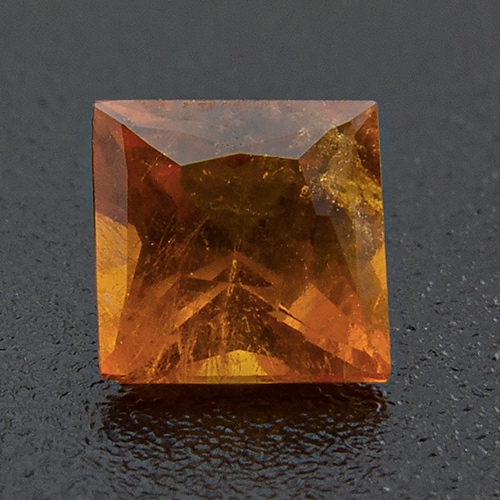 Mandarin Garnet from Namibia. 0.35 Carat. Square, distinct inclusions
