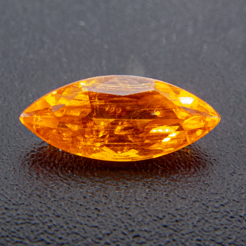 Mandarin Garnet from Namibia. 0.54 Carat. Marquise (Navette), very distinct inclusions