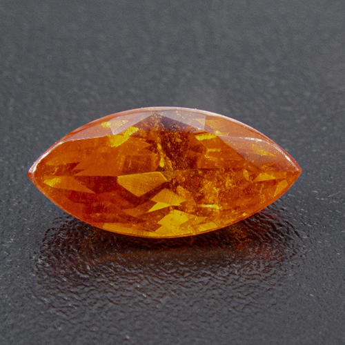 Mandarin Garnet from Namibia. 0.72 Carat. Marquise (Navette), very distinct inclusions