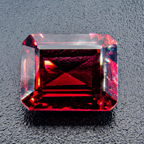 Rhodolite Garnet from India. 1.84 Carat. Emerald Cut, very small inclusions