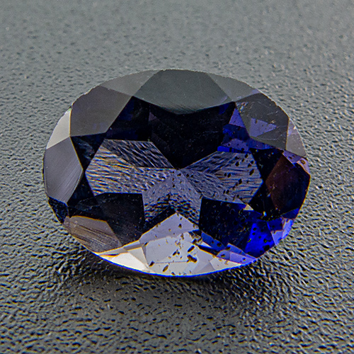 Iolite from India. 1.03 Carat. With numerous, tiny reddish hematite platelets, typical for iolite