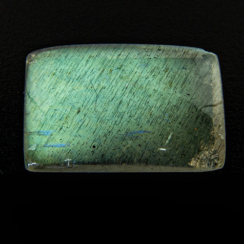 Spectrolite from Madagascar. 2.51 Carat. Cabochon Baguette, very distinct inclusions