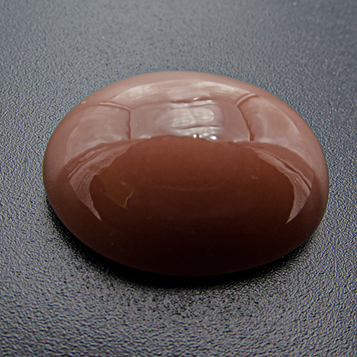 Brown Moonstone from India. 19.28 Carat. Cabochon Oval, semi-translucent