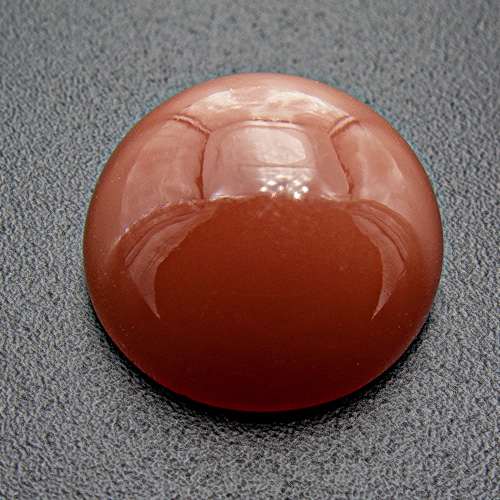 Brown Moonstone from India. 1 Piece. lLighter orangish brown to medium dark brown