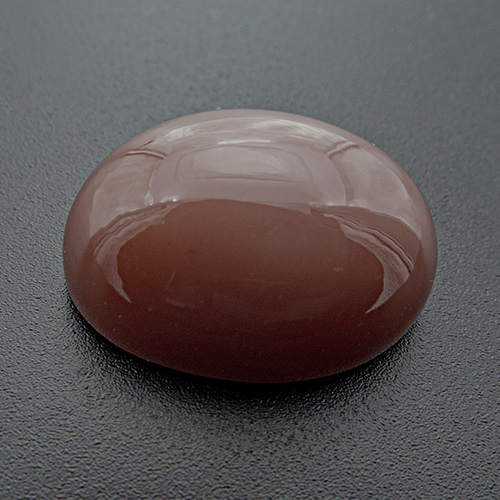Brown Moonstone from India. 21.34 Carat. Very good colour, beautiful schiller. One of our best