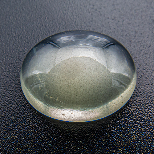Green Moonstone from India. 7.22 Carat. Cabochon Oval, distinct inclusions