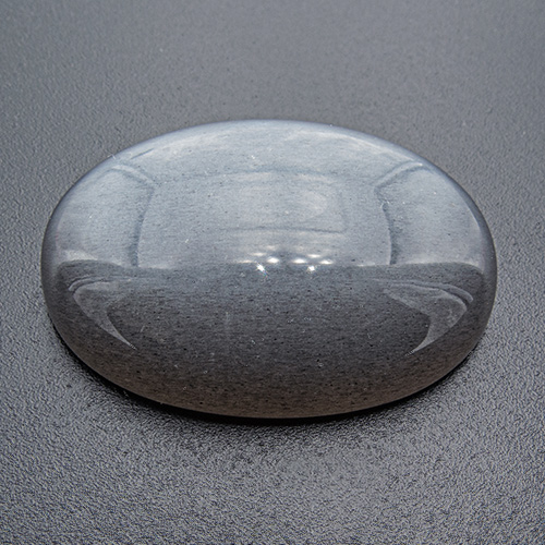 Moonstone from India. 38.93 Carat. Medium grey, fine silvery sheen