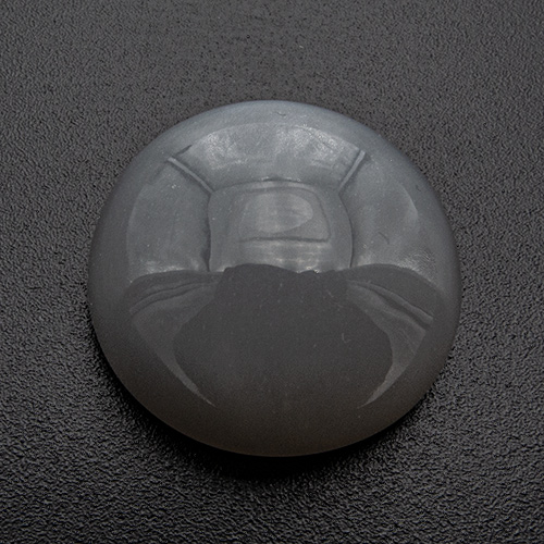 Moonstone from India. 19.2 Carat. Slightly asymmetric upper part