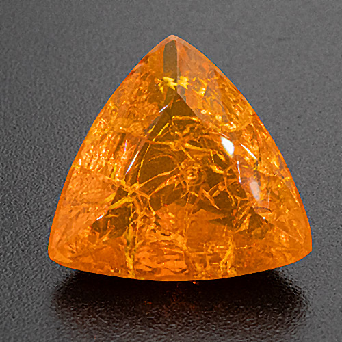 Fire Opal from Brazil. 4.19 Carat. Trillion, very, very distinct inclusions