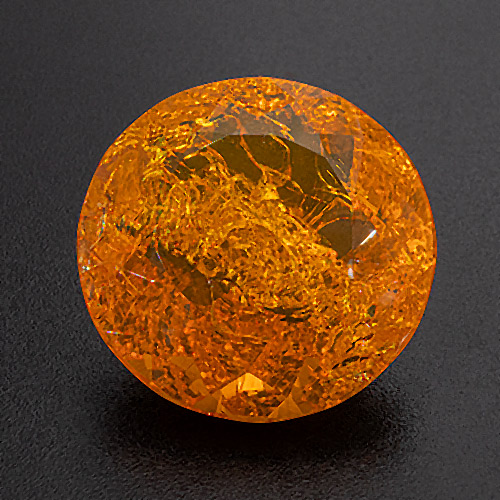 Fire Opal from Brazil. 17.11 Carat. Round, very, very distinct inclusions